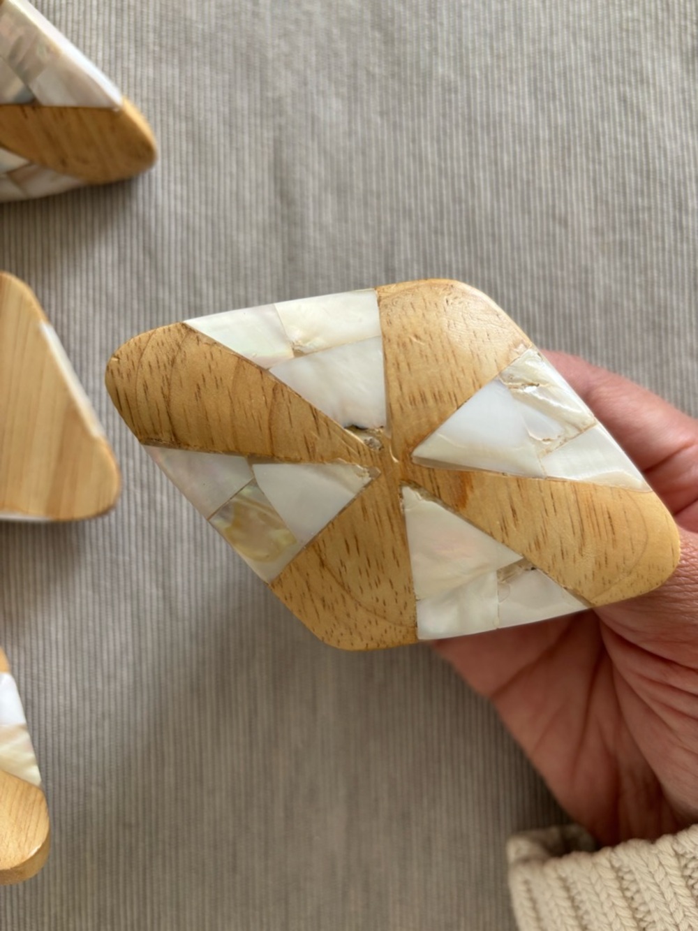 Geometric Wood and Mother-of-Pearl Decorative knobs for doors or drawers.